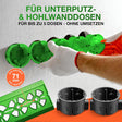 Grüne Bohrschablone Steckdose an der Wand mit fünf montierten Unterputzdosen im Abstand von 71 mm
